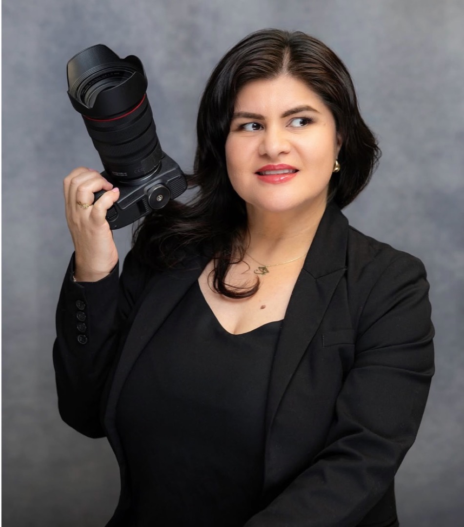 Laura Garcia holding a camera